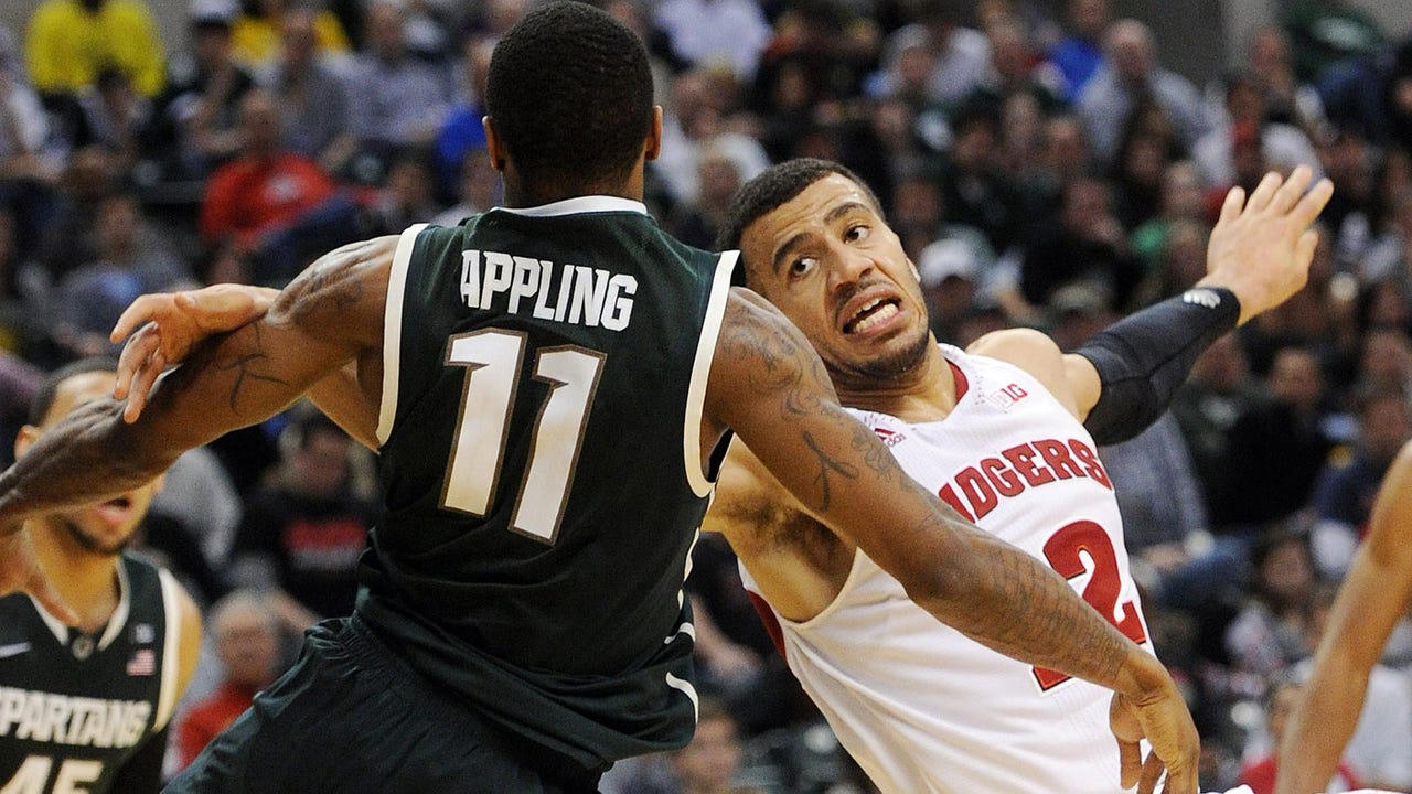 Wisconsin endures Michigan State's wrath in league-tourney slugfest
